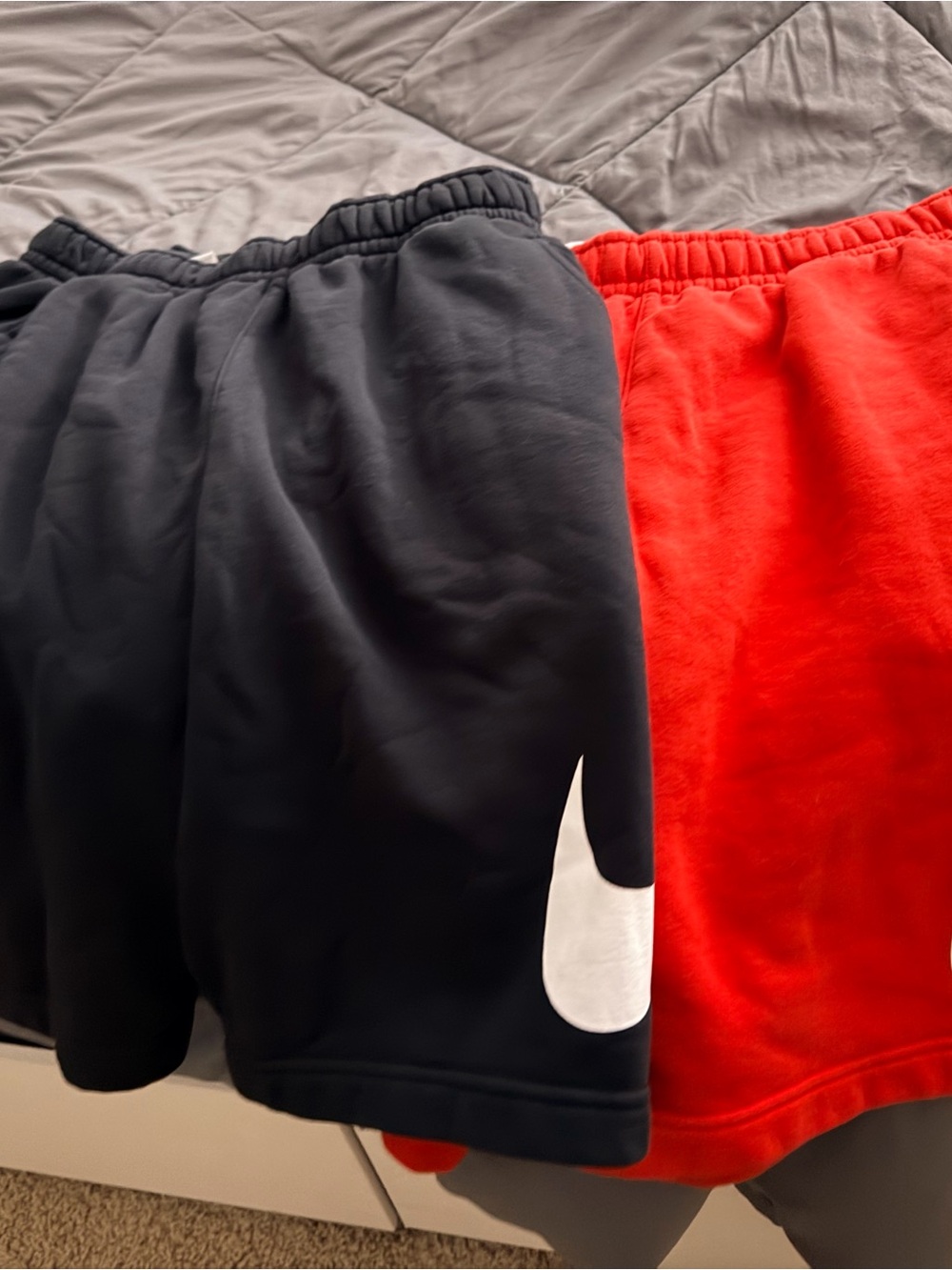 Nike Kids Black and Red Athletic Shorts with White Swoosh